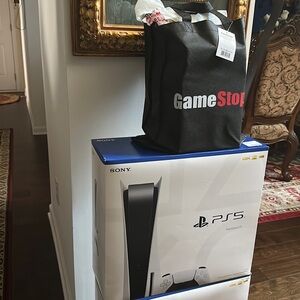 Sony PS5 video game with one controller and two games